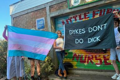 Annaig Birdy holds a sign at Dyke Pride in Brighton